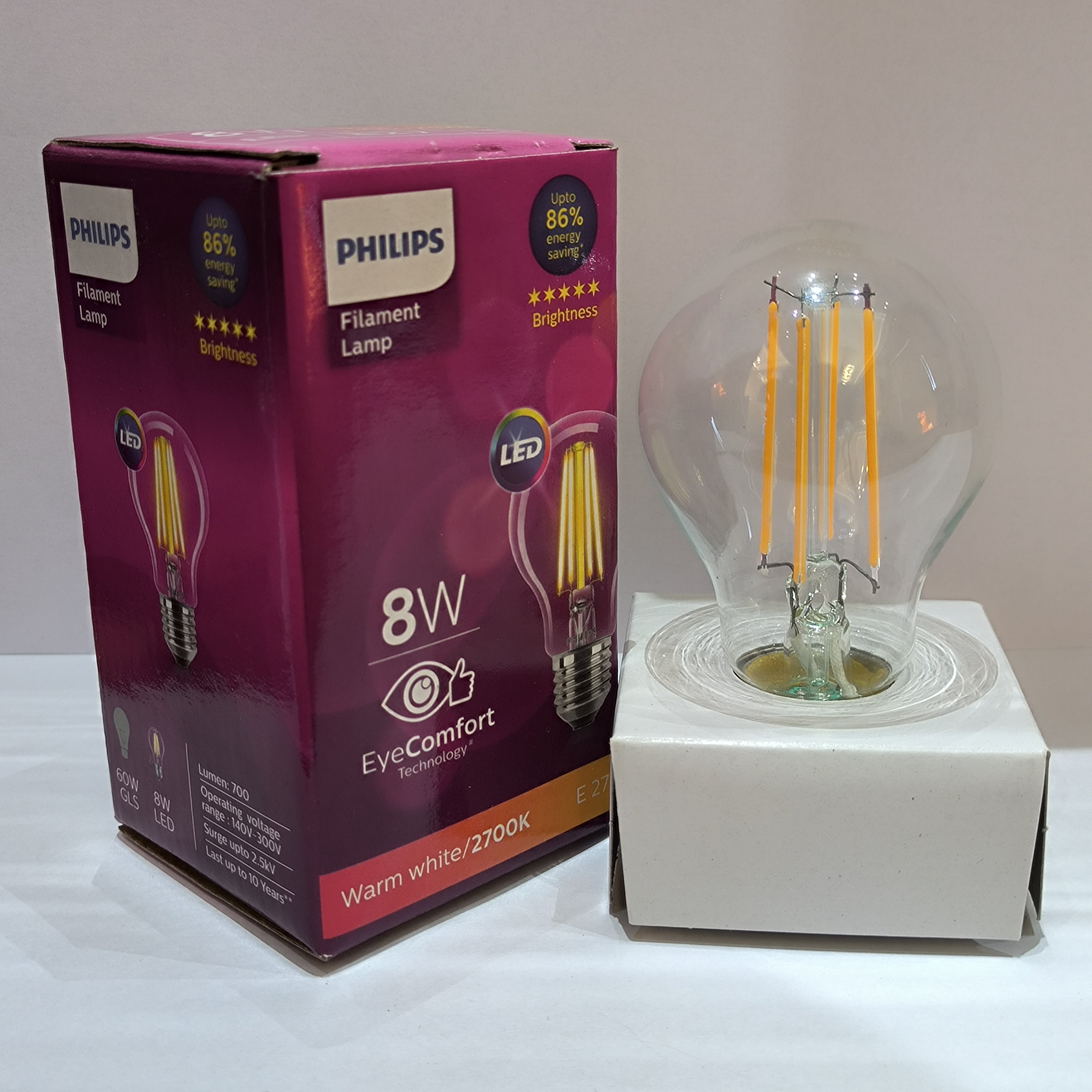Philips E-27 Filament Lamp Round Shape Warm White Bulb - 8w LED at the Best Price