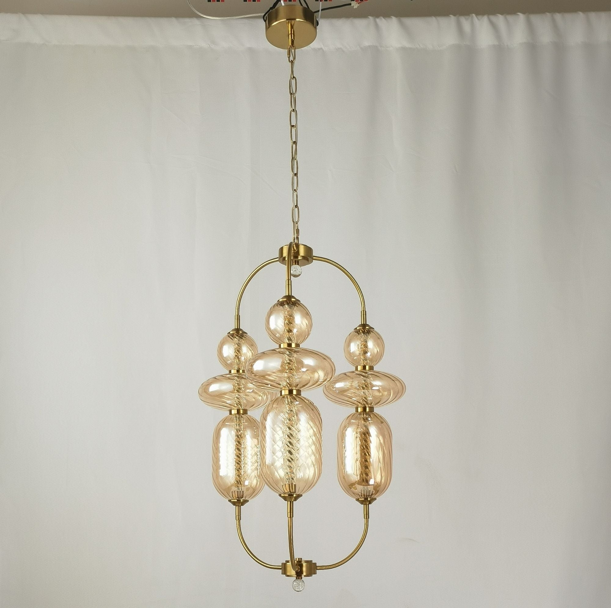 A1893/2 Gold Hardware and Amber Glass Chandelier